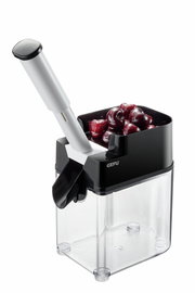 Kirschentkerner mit gefülltem Behälter, seitliche Perspektive