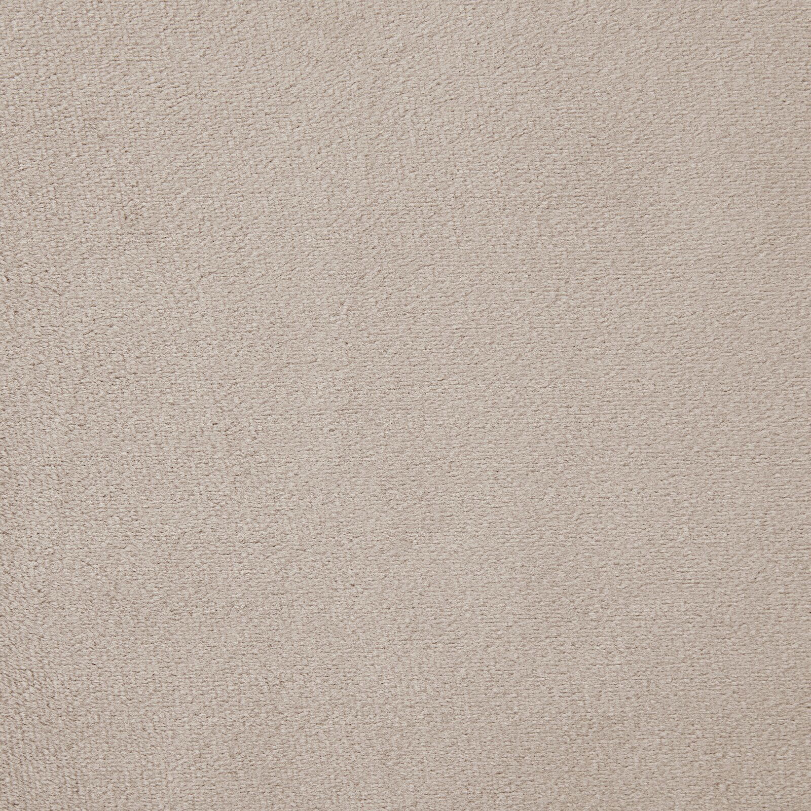Nahaufnahme einer beigen Stoffoberfläche, möglicherweise Polsterstoff für eine Sitzbank.
