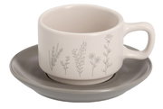 Espresso-Tasse mit Untertasse, verziert mit zarten Pflanzenmotiven, seitliche Perspektive