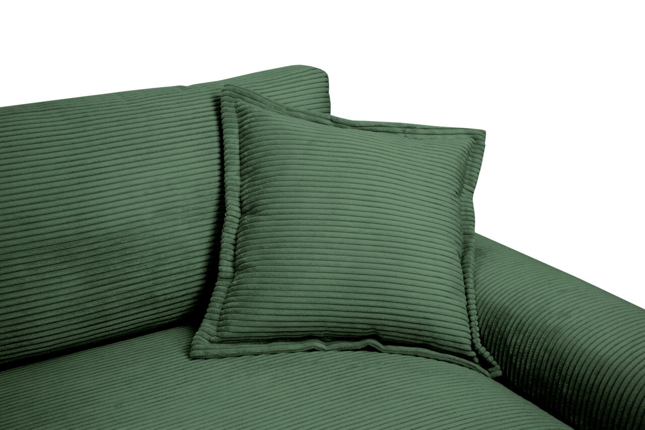 Close-up van een groene Big-bank met geribbelde stoffen bekleding en bijpassende kussens, gezien vanaf de zijkant.