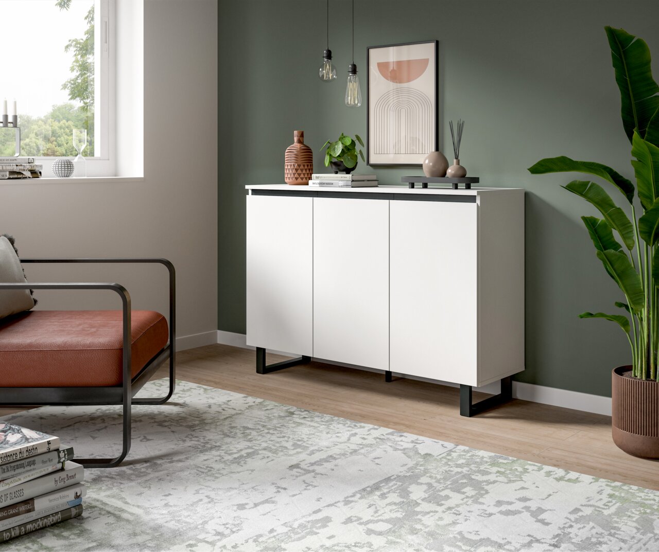MID.YOU Sideboard TOMASA Modernes weißes Sideboard mit drei Türen, schwarzem Sockel und Dekorationen, in einem stilvoll eingerichteten Wohnzimmer, seitliche Perspektive.
