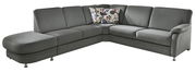 Graues Ecksofa mit floral gemusterten Kissen, seitliche Perspektive
