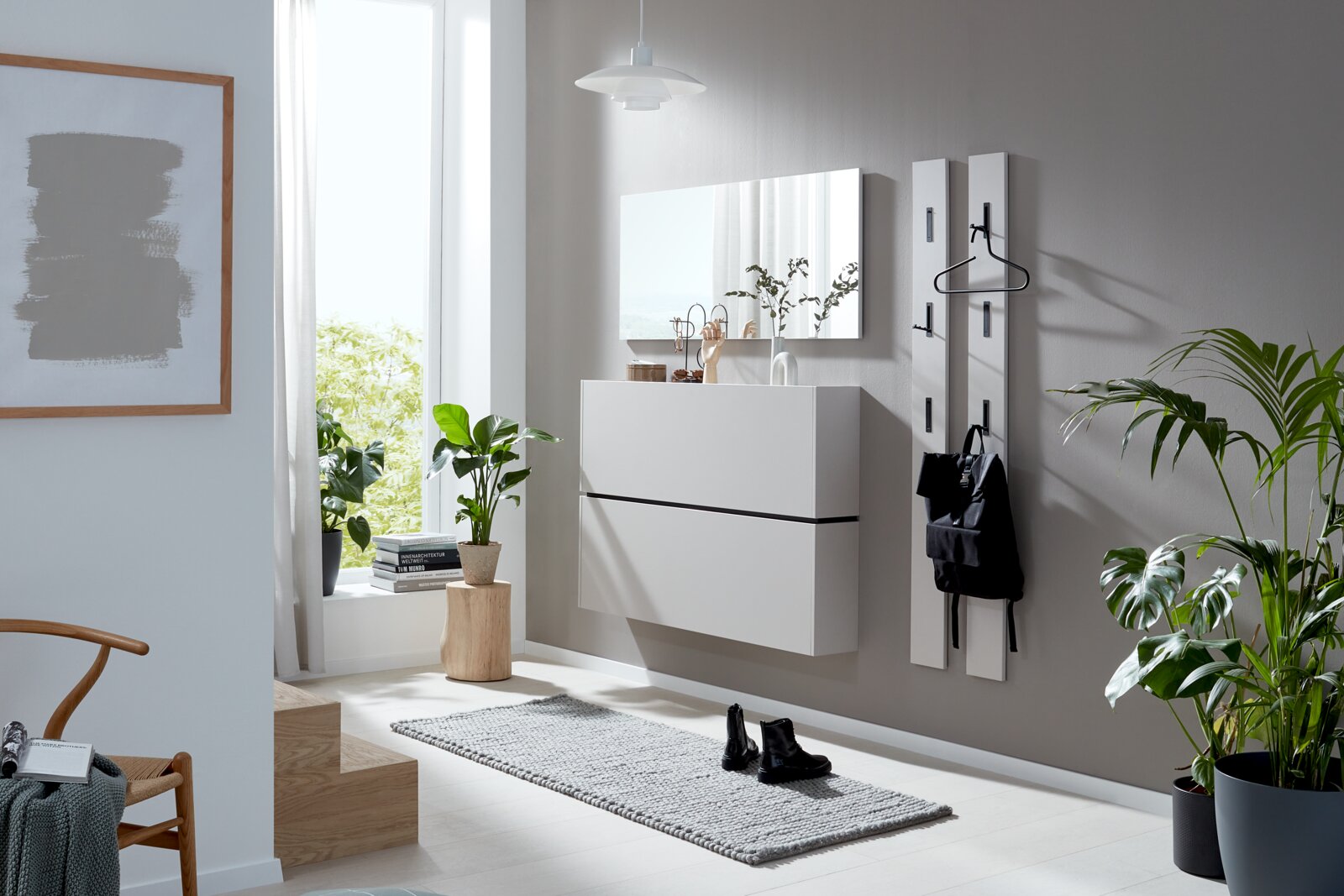 Voleo Hängeschuhschrank UNIQUE Moderner Hängeschuhschrank in einem hellen Raum, seitliche Perspektive