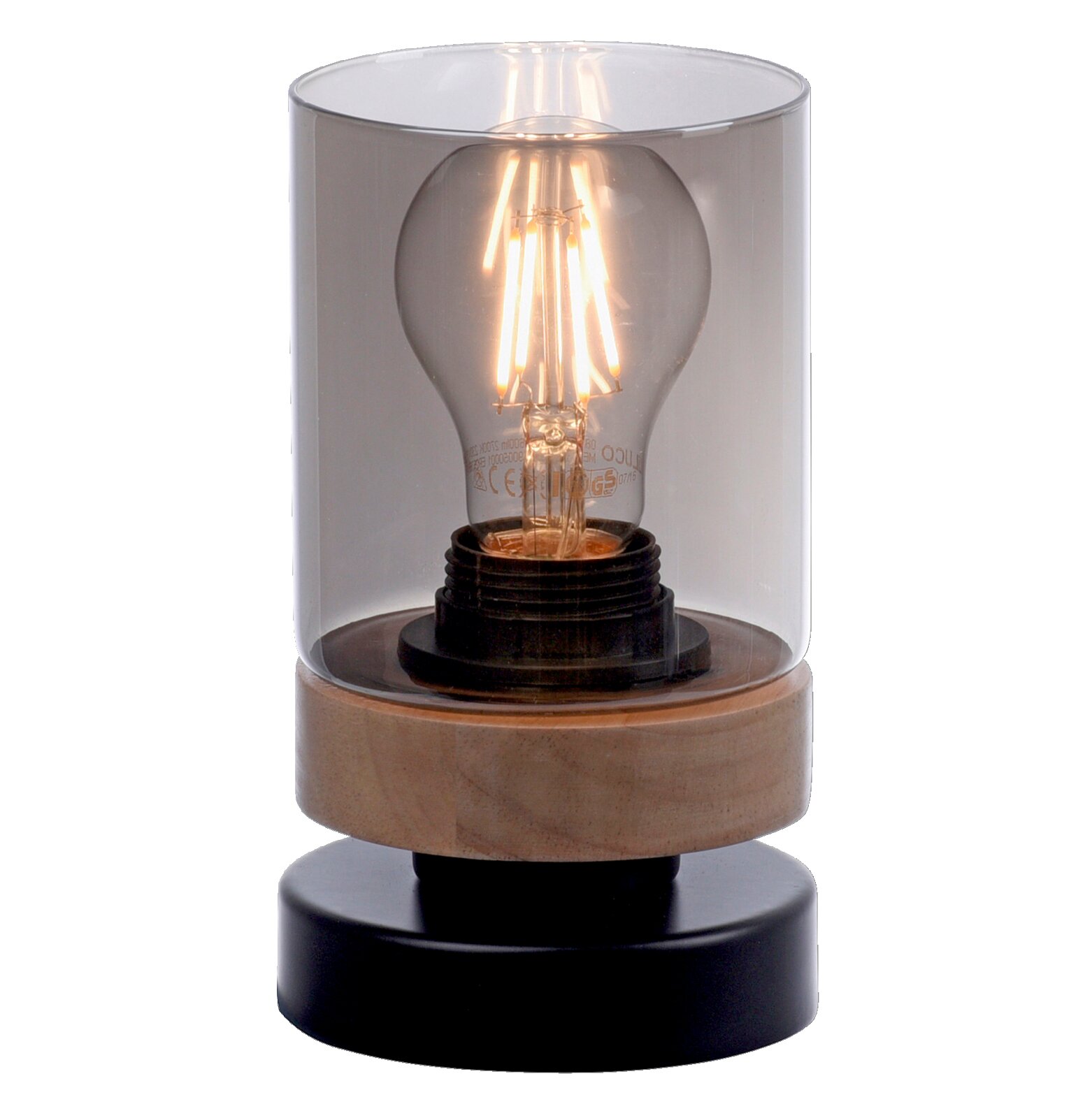 Moderne Tischleuchte mit sichtbarer Filament-Glühbirne unter transparentem Glaszylinder, Holzring und schwarzem Sockel, frontal in Nahaufnahme fotografiert