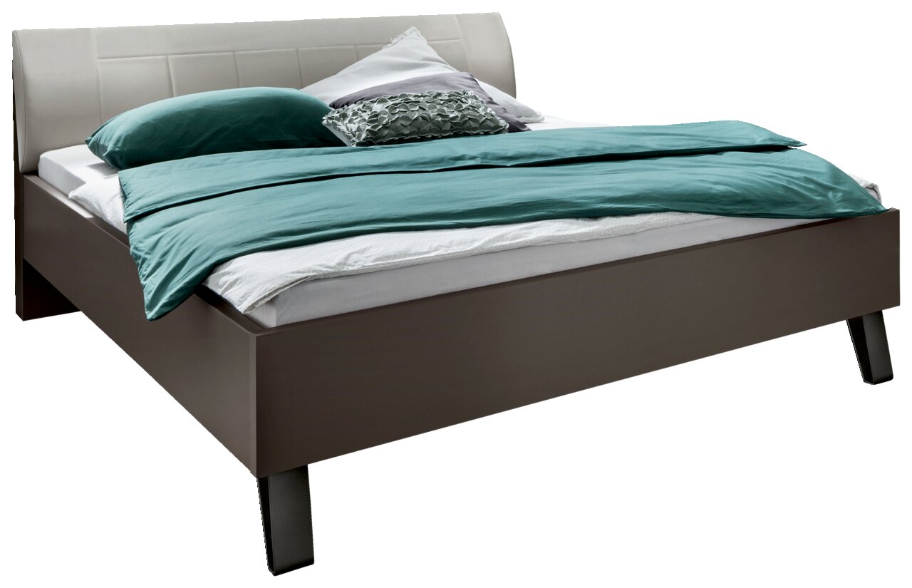 Venda Futonbett VIGO Futonbett mit modernem Design, seitliche Perspektive, ausgestattet mit grüner Bettwäsche und mehreren Kissen.