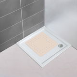 Beige Duscheinlage Mirasol in einer Duschwanne, von oben betrachtet.