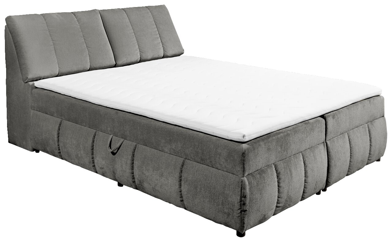 Graues Boxspringbett mit gepolstertem Kopfteil, seitliche Perspektive