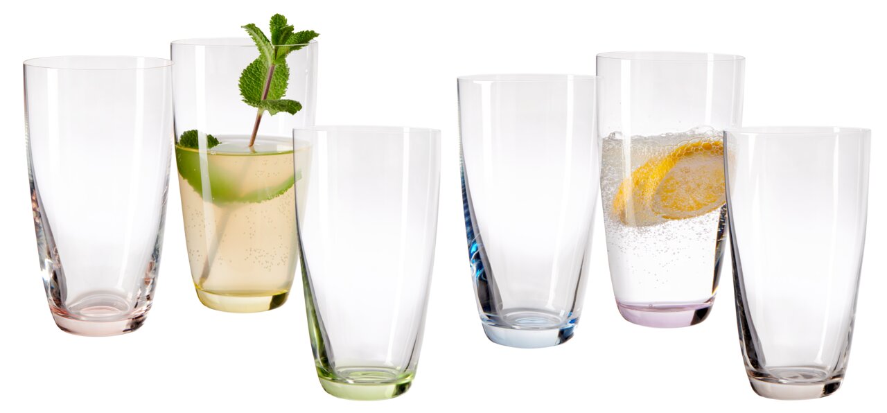 Novel Longdrinkbecher 6-tlg. VIVA COLORI Sechs Longdrinkbecher Viva Colori in verschiedenen Farben, gefüllt mit Getränken und dekoriert mit Minze und Zitronenscheiben, aus der Vorderansicht.