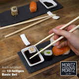 Sushi-Set auf Schieferplatte mit Essstäbchen, Nahaufnahme von oben