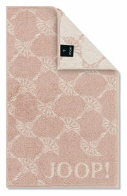 Gästetuch in Rosa mit geometrischem Muster und JOOP! Logo, von oben fotografiert