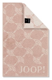 Gästetuch in Rosa mit geometrischem Muster und JOOP! Logo, von oben fotografiert