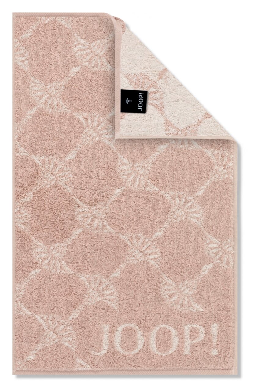 Gästetuch in Rosa mit geometrischem Muster und JOOP! Logo, von oben fotografiert
