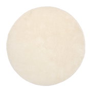 Runder, cremefarbener Teppich mit weicher Oberfläche, Draufsicht