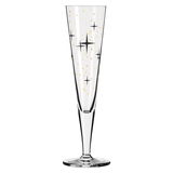 Champagnerglas mit goldenen und schwarzen Sternen, frontal betrachtet