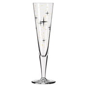 Champagneglas met gouden en zwarte sterren, gezien van voren