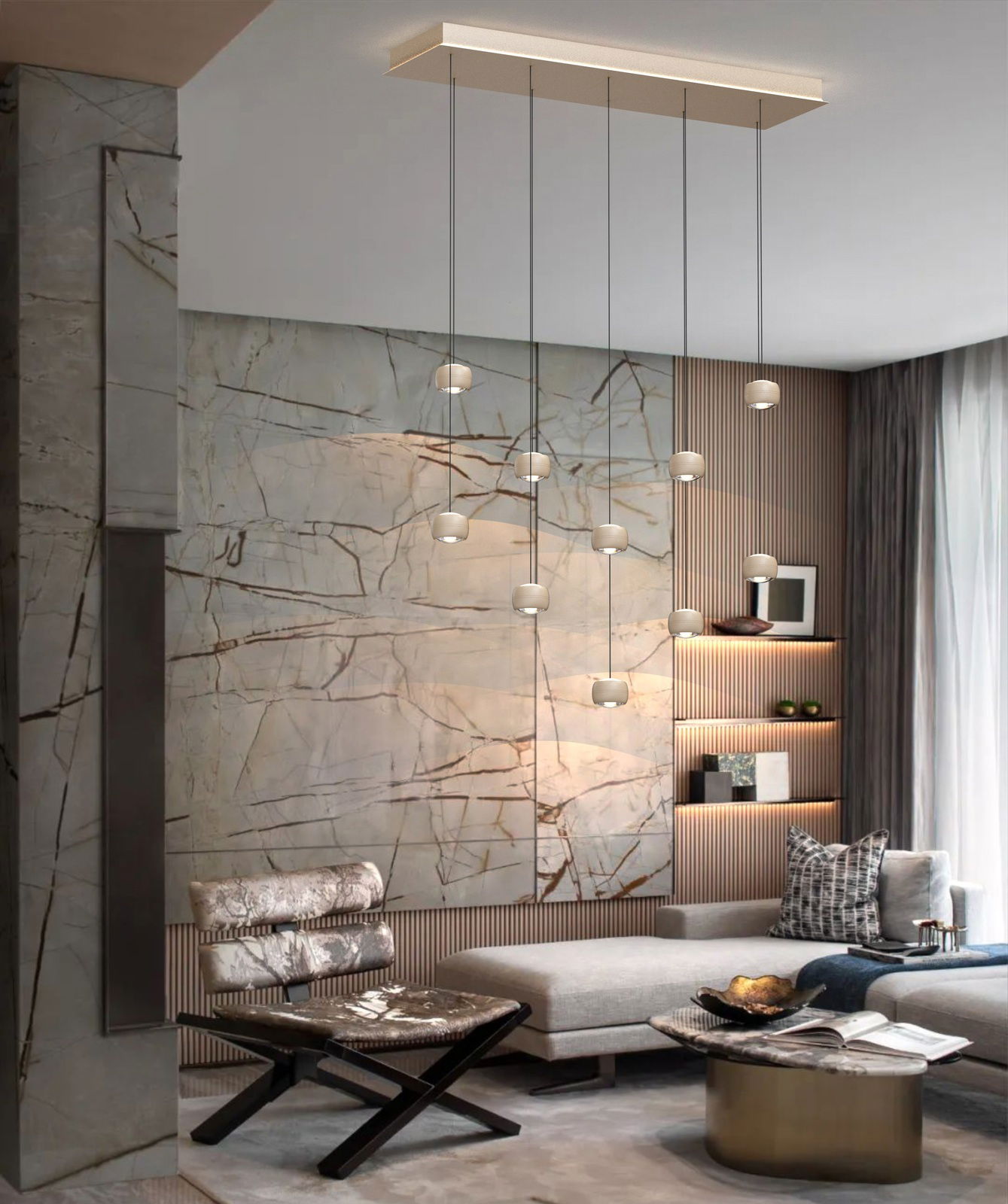 Moderne LED-Pendelleuchte mit mehreren hängenden Leuchtkörpern in einem stilvoll eingerichteten Wohnzimmer, seitliche Perspektive.