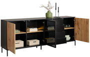 XL-Sideboard mit offenen Türen, zeigt Regale mit Büchern, Boxen und Geschirr, dekoriert mit einer Vase und Kerzenhaltern, seitliche Perspektive.