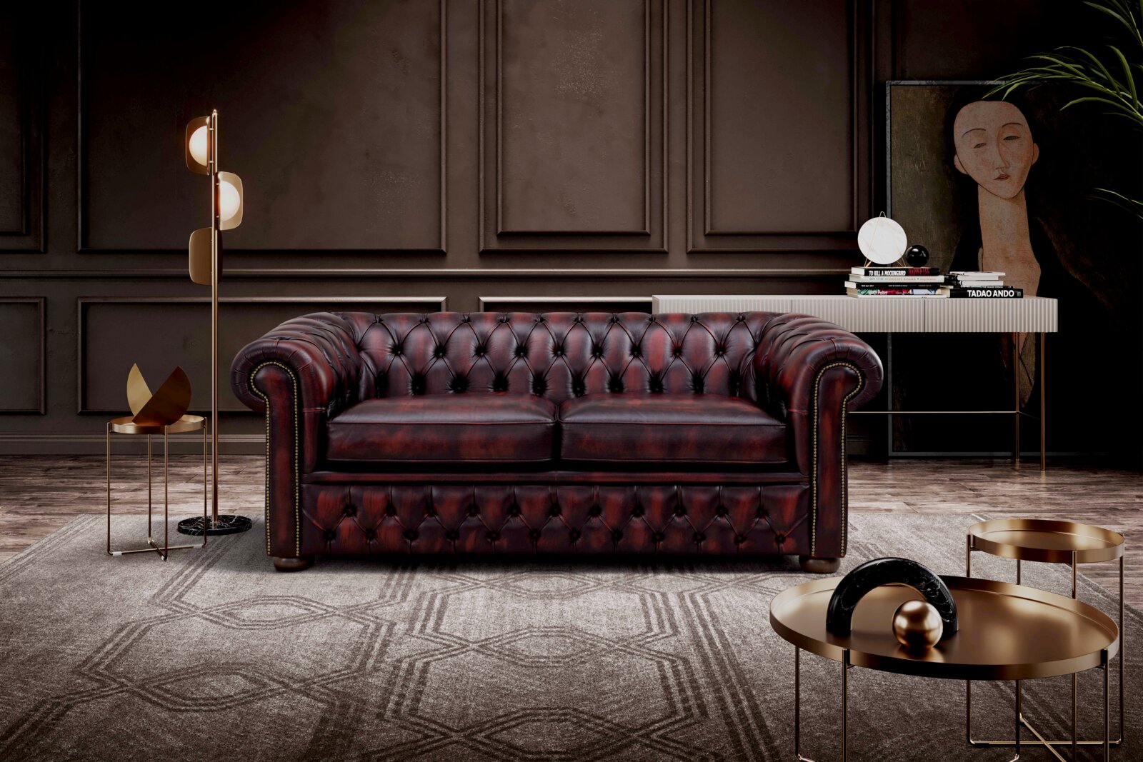 Elegantes, dunkelrotes Chesterfield-Sofa mit zwei Sitzplätzen in einem stilvoll eingerichteten Wohnzimmer, frontal betrachtet.