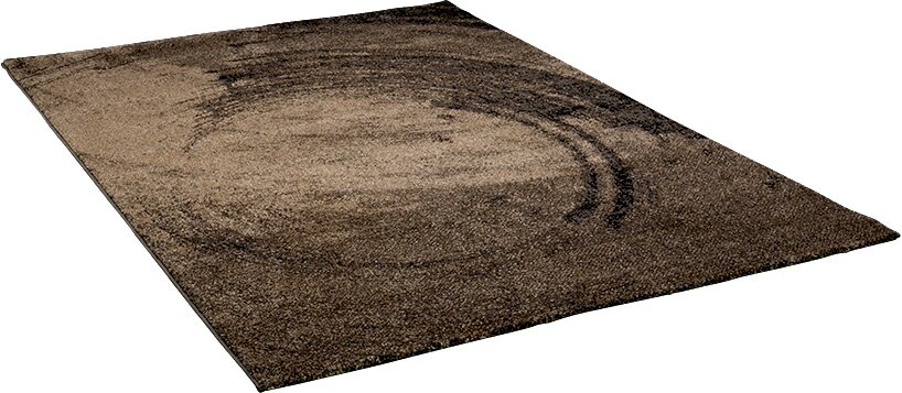 Rechteckiger Teppich in Braun- und Beigetönen mit abstraktem Kreis-/Wischmuster, schräg von oben in Perspektive fotografiert