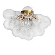 Pendelleuchte mit goldener Halterung und klaren Glaskugeln, von unten betrachtet