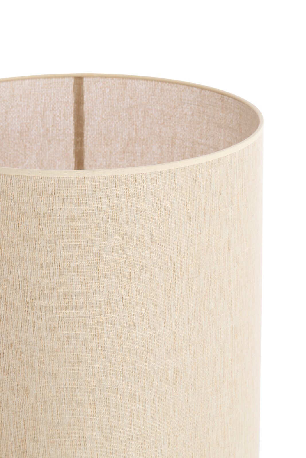Cilindrische, beige stoffen lampenkap, close-up vanuit een schuine hoek van bovenaf