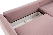 Nahaufnahme einer rosa gepolsterten Rundecke mit Stauraum, von oben betrachtet.