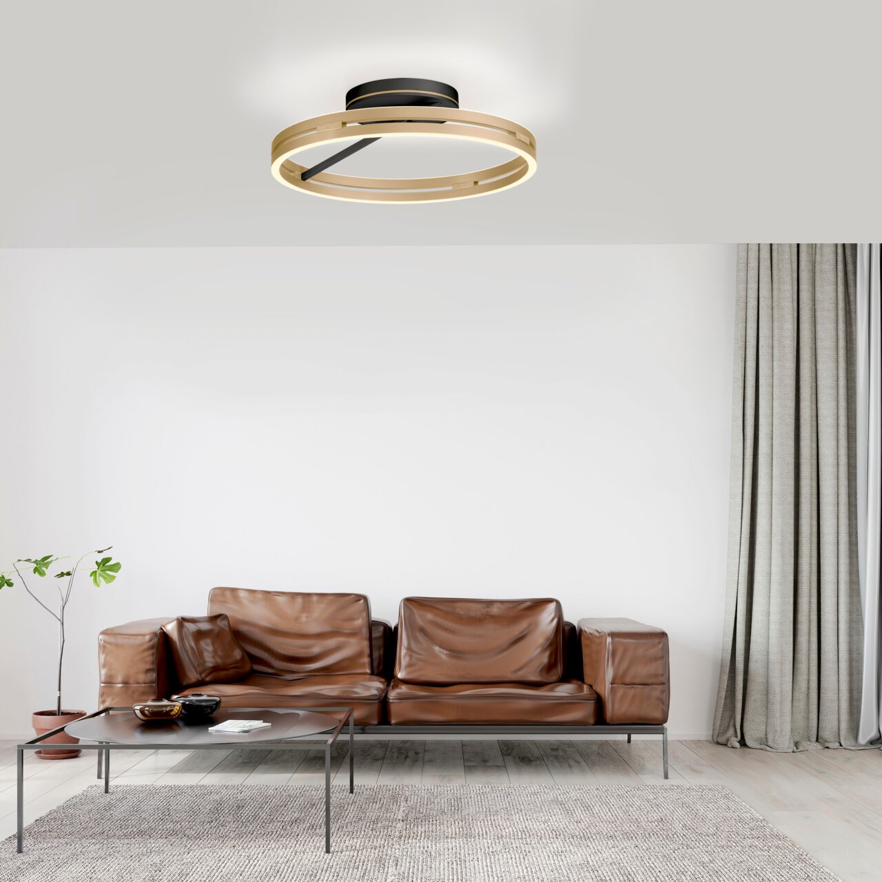 Moderne Deckenleuchte PURE Loop in einem stilvollen Wohnzimmer, von unten betrachtet.