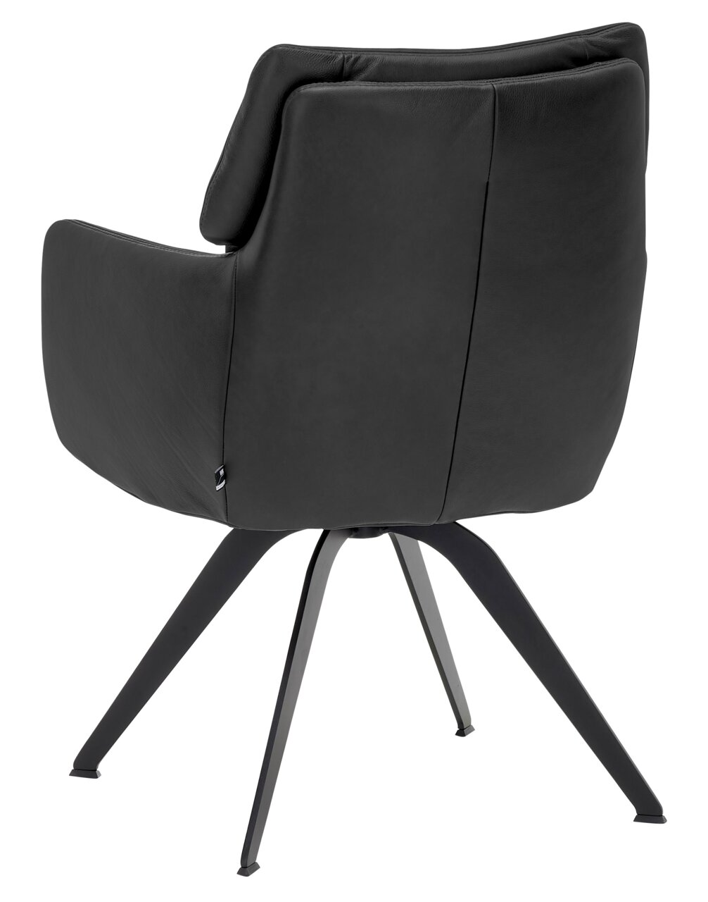 Achterkant van een moderne, zwarte fauteuil met metalen poten, model WK 723 van WK-Wohnen.