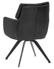 Achterkant van een moderne, zwarte fauteuil met metalen poten, model WK 723 van WK-Wohnen.