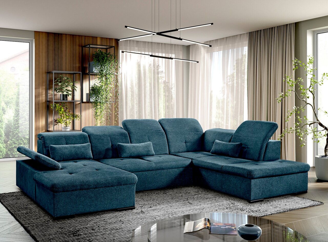 Moderne blaue Rundecke mit verstellbaren Kopfstützen in einem stilvollen Wohnzimmer, seitliche Perspektive.