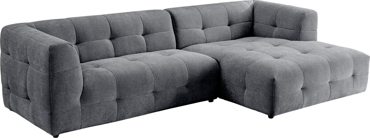 Graues, gepolstertes Ecksofa mit gesteppter Polsterung und rechter Ottomane, Ansicht schräg von vorne links