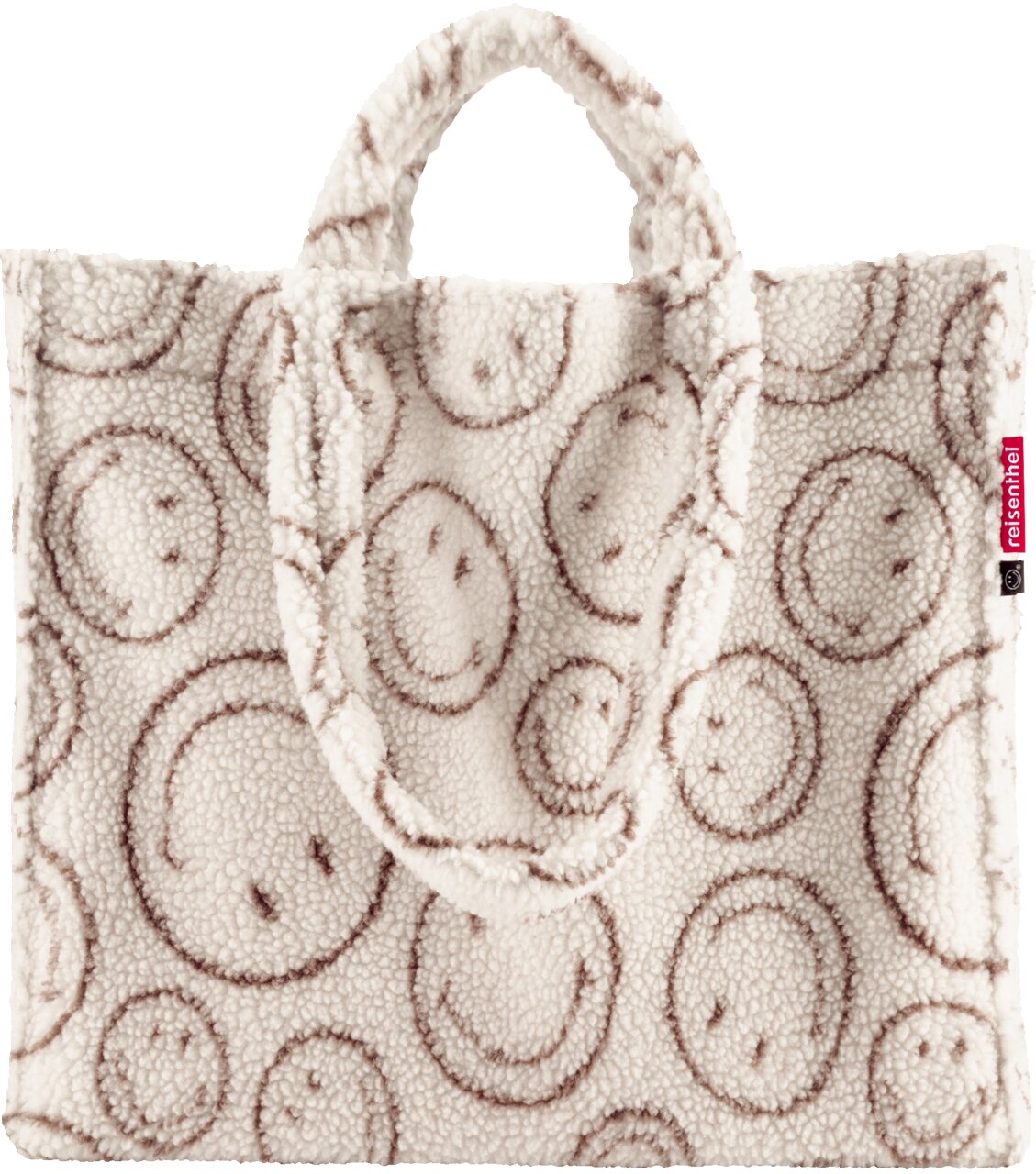 Flauschige Tote-Bag aus Teddyfell in Creme mit braunem Smiley-Muster und kurzen Henkeln, Frontansicht auf weißem Hintergrund