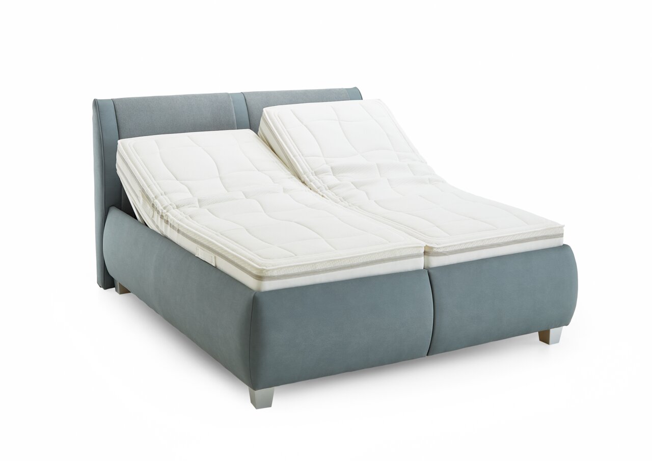 Polsterbett mit verstellbaren Matratzen, seitliche Perspektive