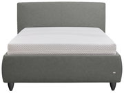 Gepolstertes Doppelbett in Dunkelgrau mit hohem, schlichtem Kopfteil und abgerundetem Fußteil, inklusive weißer Matratze; Frontalansicht.