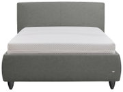 Gepolstertes Doppelbett in Dunkelgrau mit hohem, schlichtem Kopfteil und abgerundetem Fußteil, inklusive weißer Matratze; Frontalansicht.