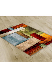 Teppich Avalon ca. 80x150cm mit buntem geometrischem Muster, aus der Vogelperspektive auf hellem Holzboden fotografiert