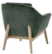 Rückansicht eines Sessels mit grünem, geripptem Stoffbezug und hellen Holzbeinen.