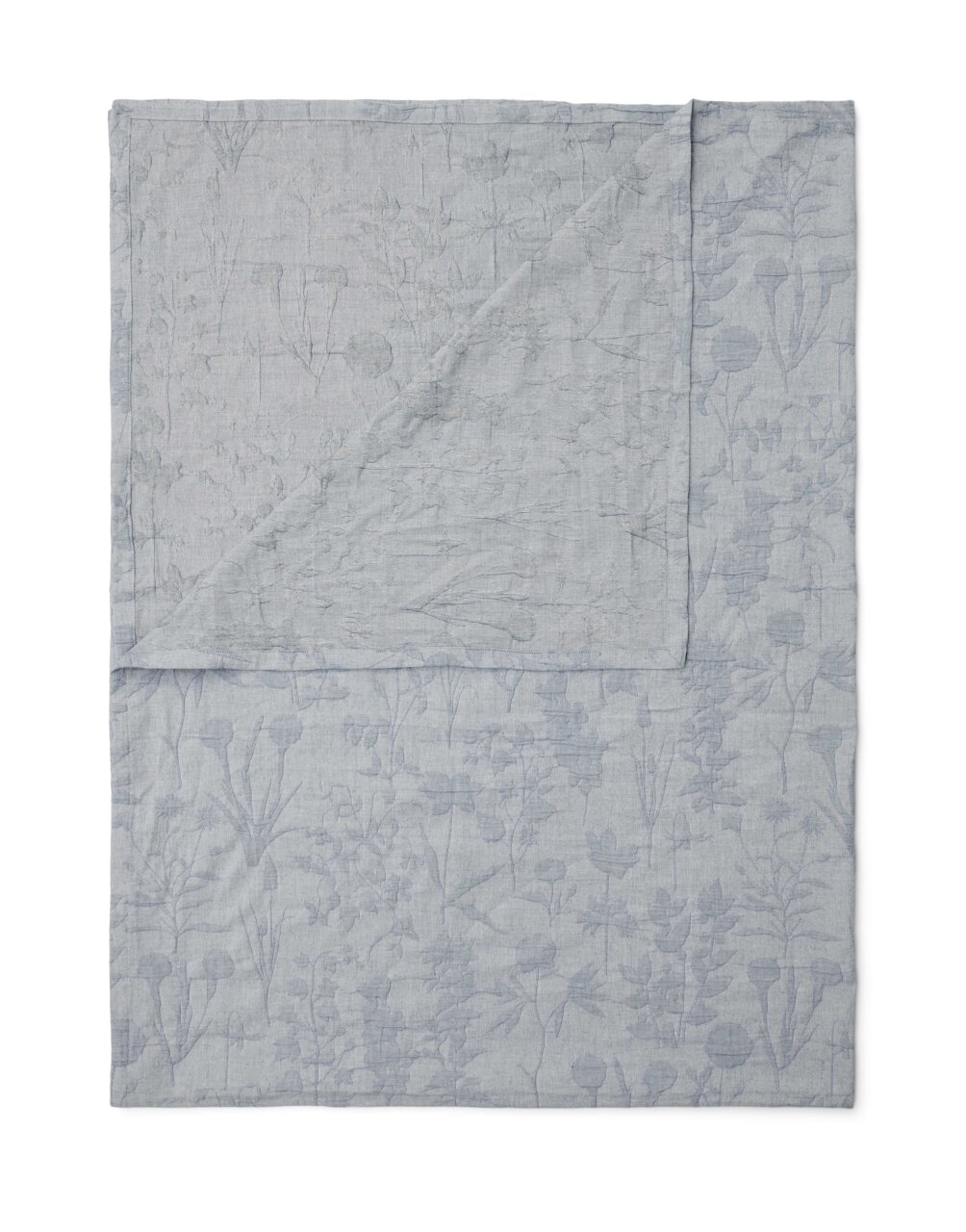 Graues Plaid mit floralen Mustern, ausgebreitet und teilweise umgeschlagen, Draufsicht