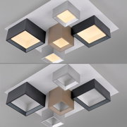 Moderne led-plafondlamp met geometrische vormen in verschillende kleuren, gezien van onderaf.