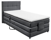 Graues Boxspringbett mit weißer Matratze, seitliche Perspektive, mit Fernbedienung an der Seite