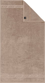 Beiges Joop! Frottier-Handtuch mit eingewebter Logo-Bordüre, flach von oben (Frontansicht) fotografiert, eine Ecke umgeschlagen und Etikett sichtbar.