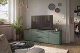 Modernes TV-Lowboard in einem stilvollen Wohnzimmer, seitliche Perspektive