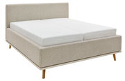 Beiges Polsterbett mit Holzfüßen, seitliche Perspektive