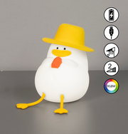 Niedliches Akku-Nachtlicht in Form einer Ente mit gelbem Hut und orangefarbenem Schnabel, seitliche Perspektive.