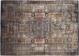 Vogelperspektive auf einen Designer-Teppich mit komplexem, orientalischem Muster in Erdtönen und blauen Akzenten.
