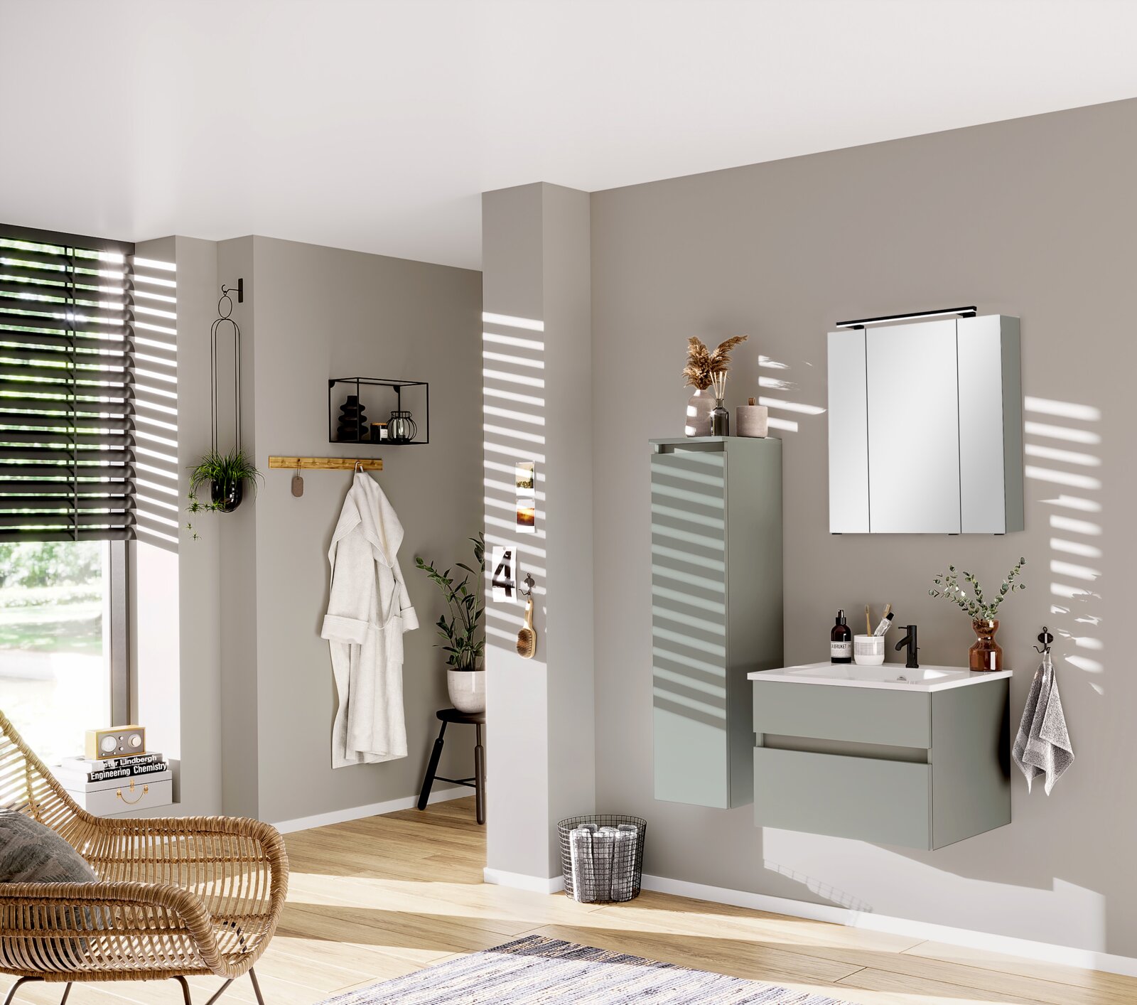 Modernes Badezimmer mit grauem Badblock, bestehend aus einem Hängeschrank, Waschbeckenunterschrank und Spiegelschrank, seitliche Perspektive.