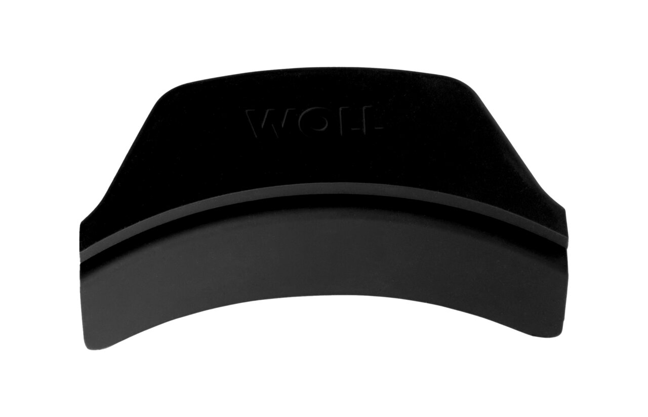Zwarte siliconen handgreep met het opschrift 'WOLL', gezien van bovenaf.