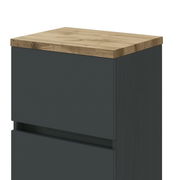 Moderner Unterschrank mit dunkler Front und heller Holzplatte, seitliche Perspektive