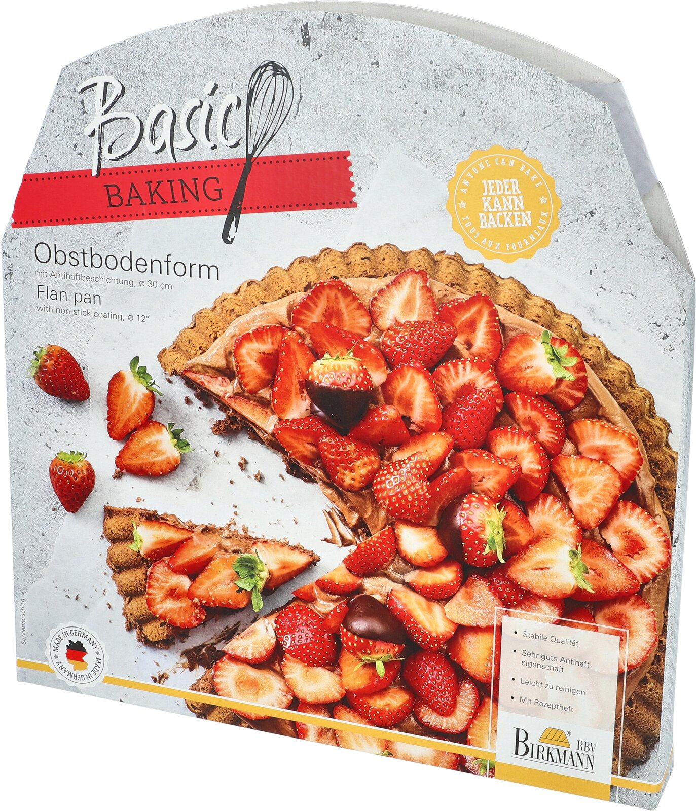Verpakking van een taartbodemvorm met een afbeelding van een aardbeientaart, licht van bovenaf gezien.