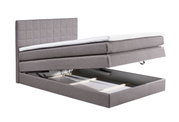 Graues Boxspringbett XORA HAWAII mit geöffnetem Bettkasten, seitliche Perspektive